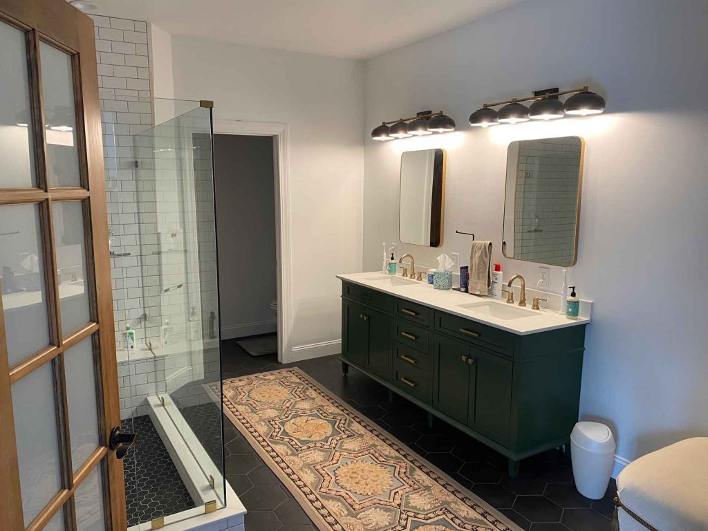 Newly remodeled bathroom designed by Home Pro Builders LLC