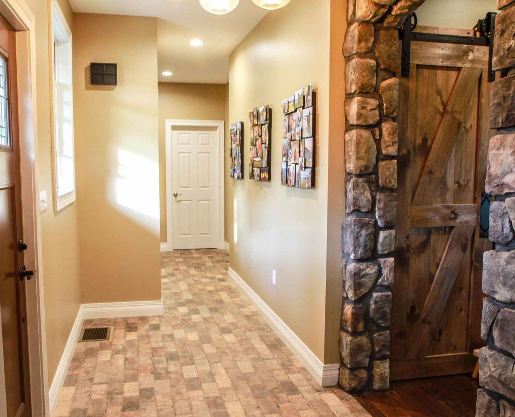 Hallway with new flooring installed by Home Pro Builders LLC