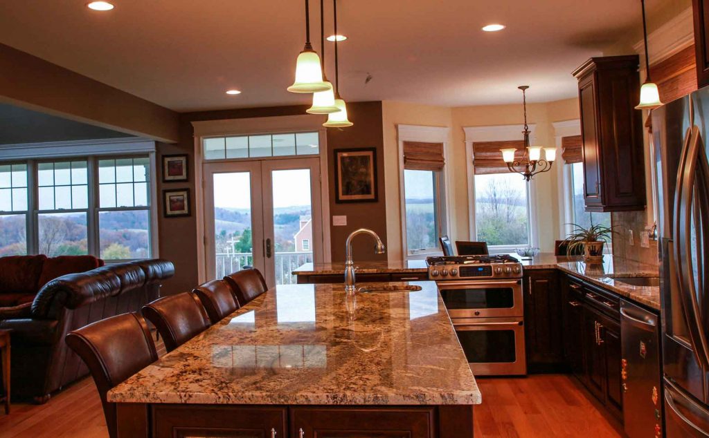 Kitchen with new granite countertops and cabinets installed by Home Pro Builders LLC